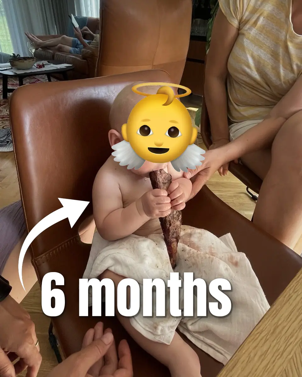 Baby eating real food