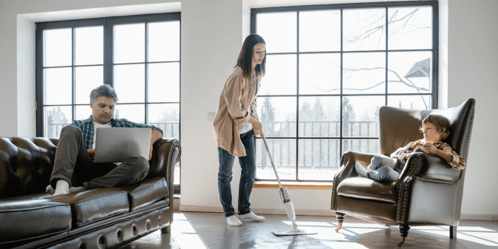 Man and child sitting in living room
